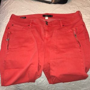 Torrid red/orange jeggings with zipper ankles